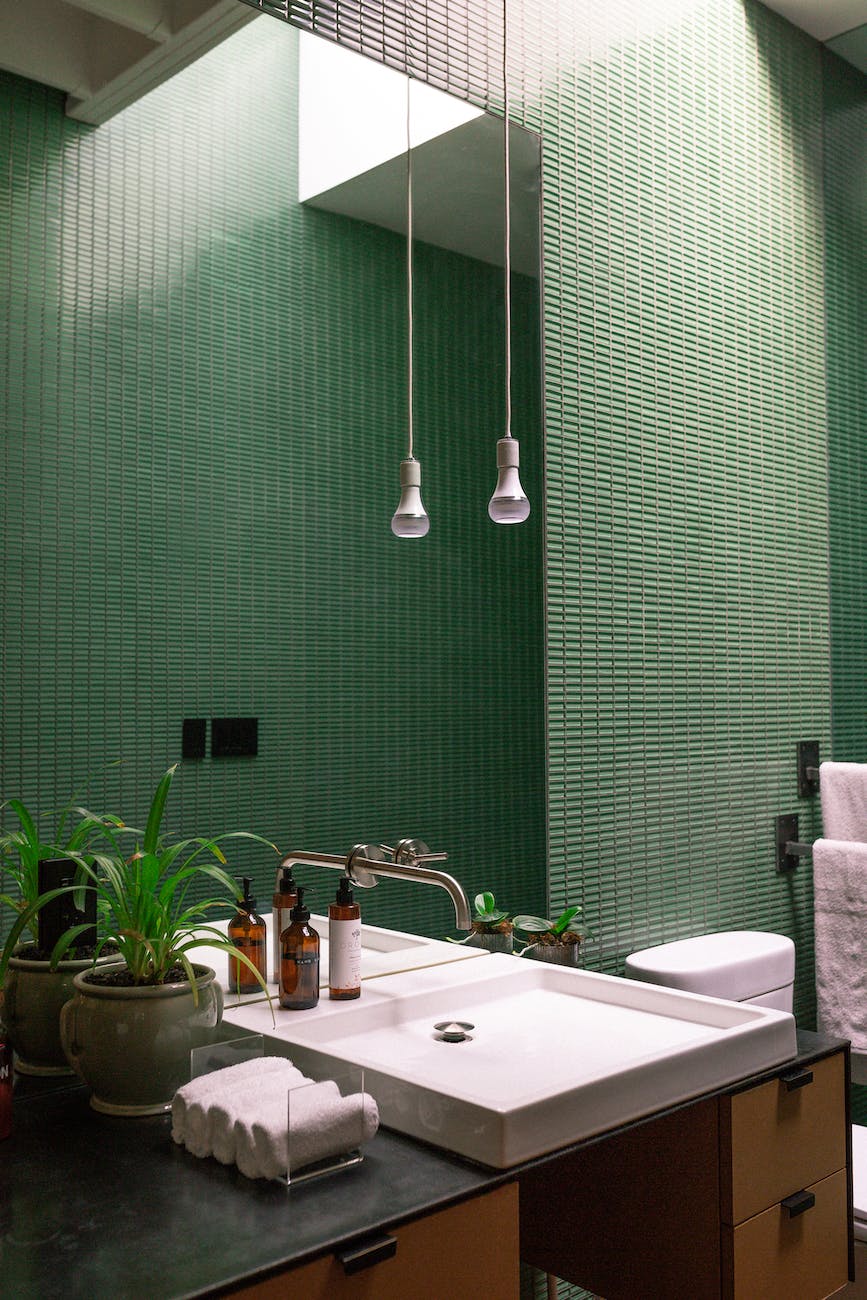 white ceramic sink with faucet